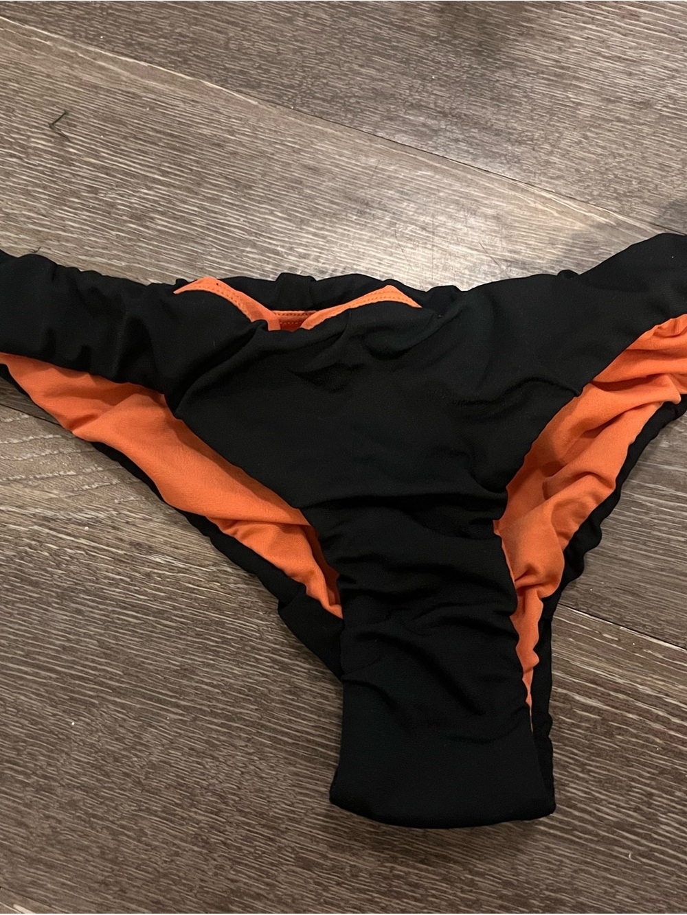 Jolyn Clothing Reversible Black & Orange Bikini Bottom